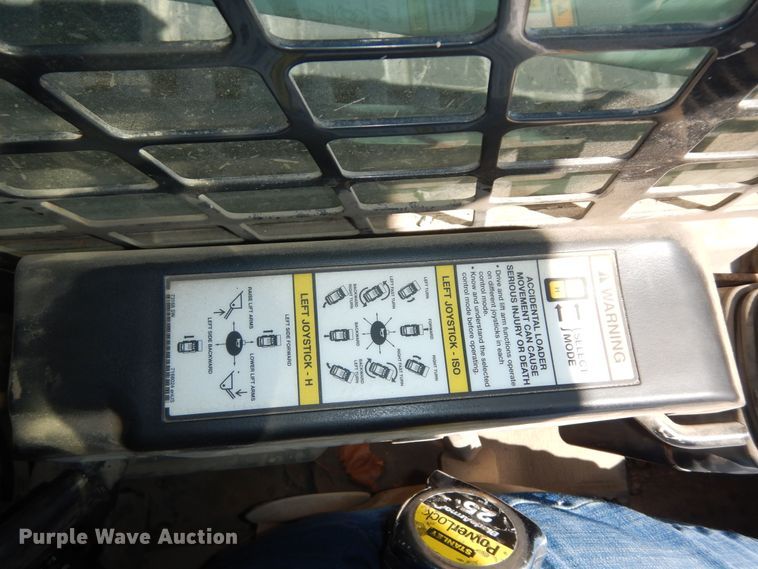 image for item DM3053 2014 Bobcat T750  tracked skid steer loader