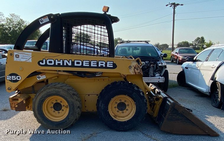 image for item JA9046 2000 John Deere 250  skid steer loader