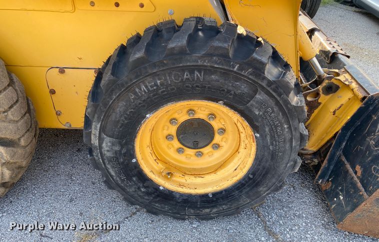 image for item JA9046 2000 John Deere 250  skid steer loader