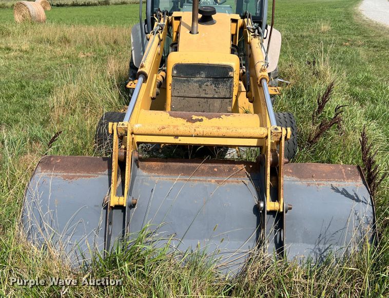 image for item JX9482 1998 New Holland 555E  backhoe