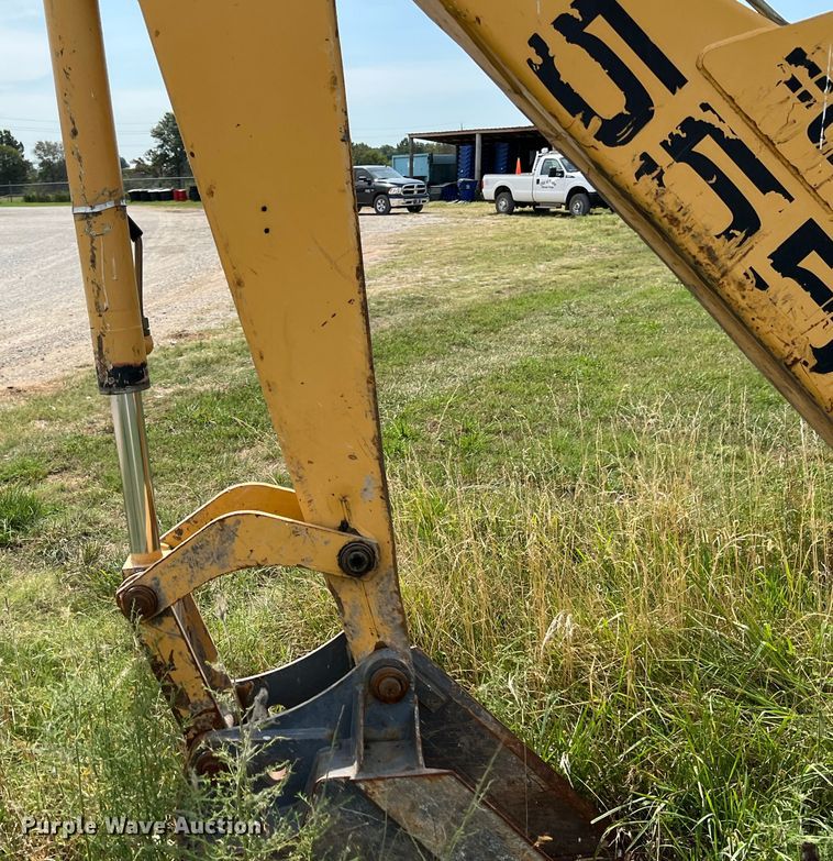 image for item JX9483 1997 New Holland 555E  backhoe