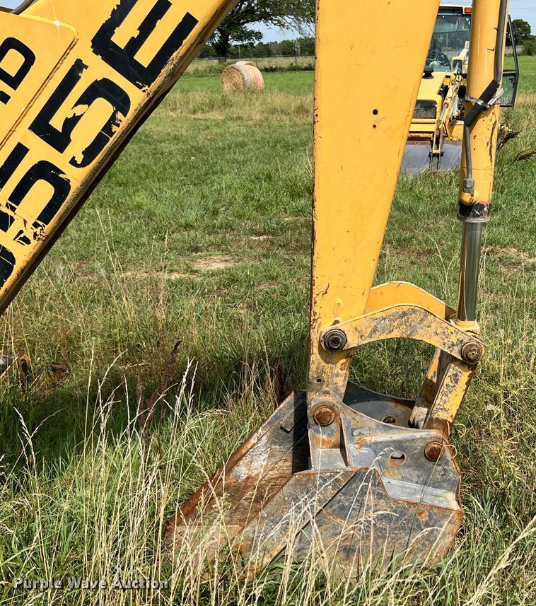 image for item JX9483 1997 New Holland 555E  backhoe