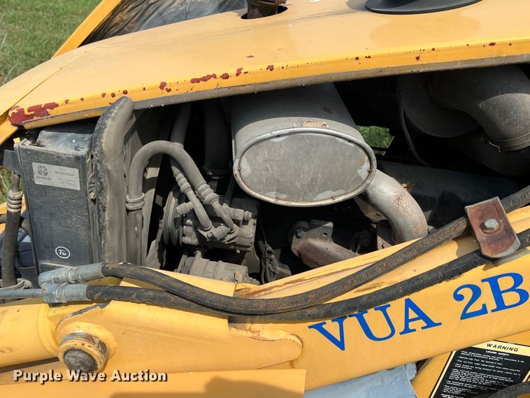 image for item JX9483 1997 New Holland 555E  backhoe