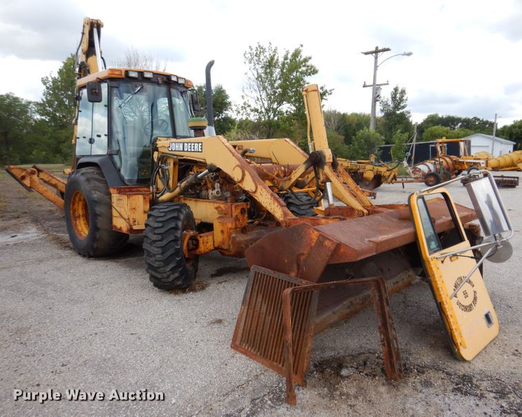 image for item KP9384 1998 John Deere 710D  backhoe