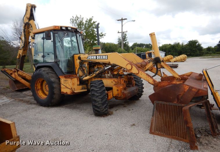 image for item KP9384 1998 John Deere 710D  backhoe