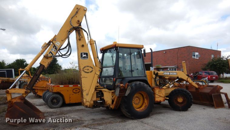 image for item KP9384 1998 John Deere 710D  backhoe