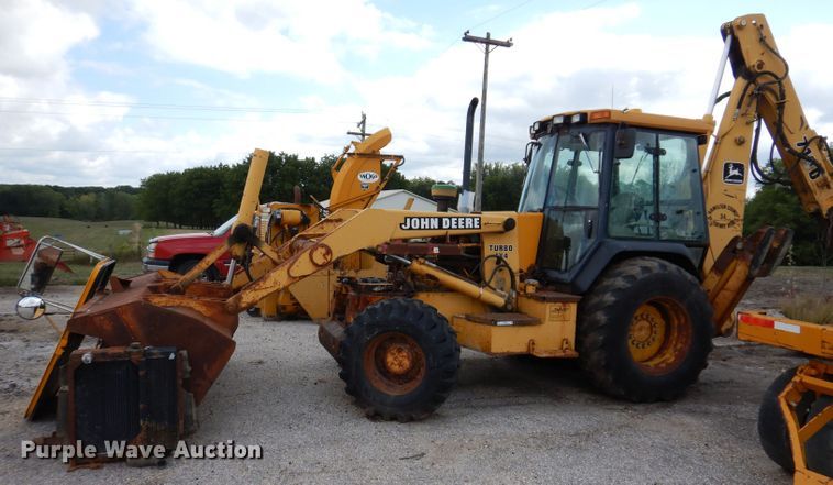 image for item KP9384 1998 John Deere 710D  backhoe