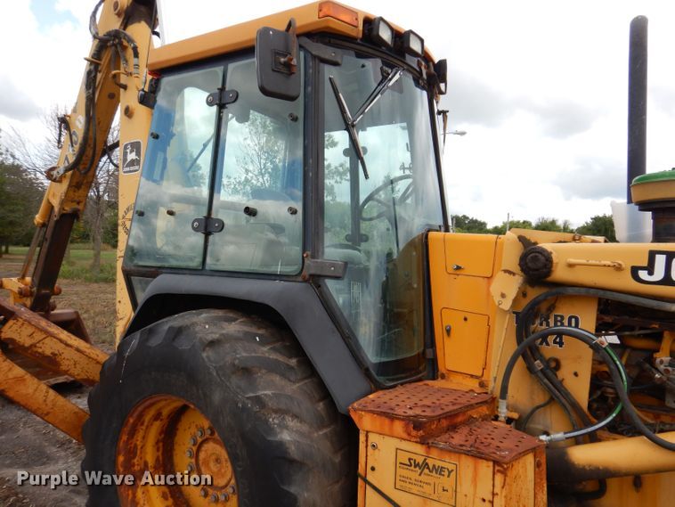 image for item KP9384 1998 John Deere 710D  backhoe