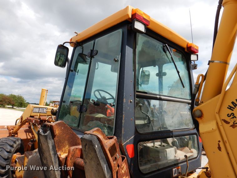 image for item KP9384 1998 John Deere 710D  backhoe