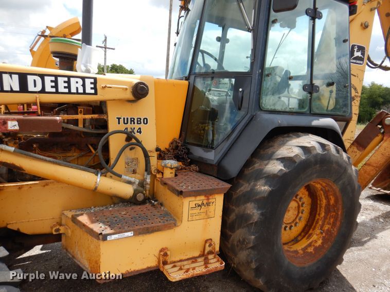 image for item KP9384 1998 John Deere 710D  backhoe