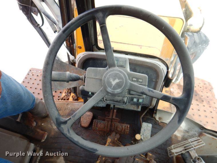 image for item KP9384 1998 John Deere 710D  backhoe