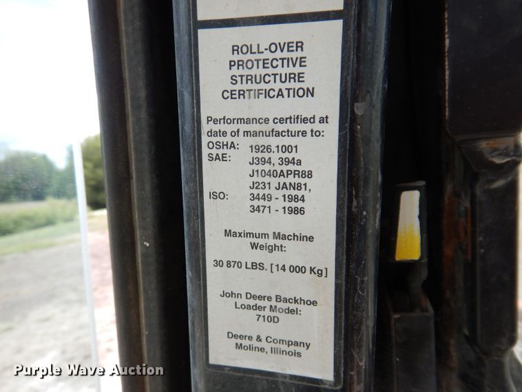 image for item KP9384 1998 John Deere 710D  backhoe