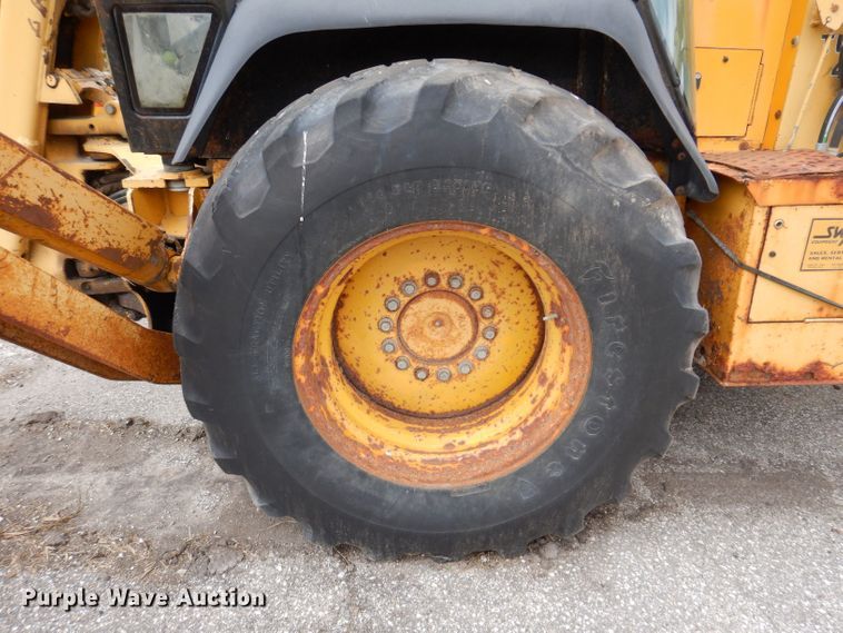 image for item KP9384 1998 John Deere 710D  backhoe