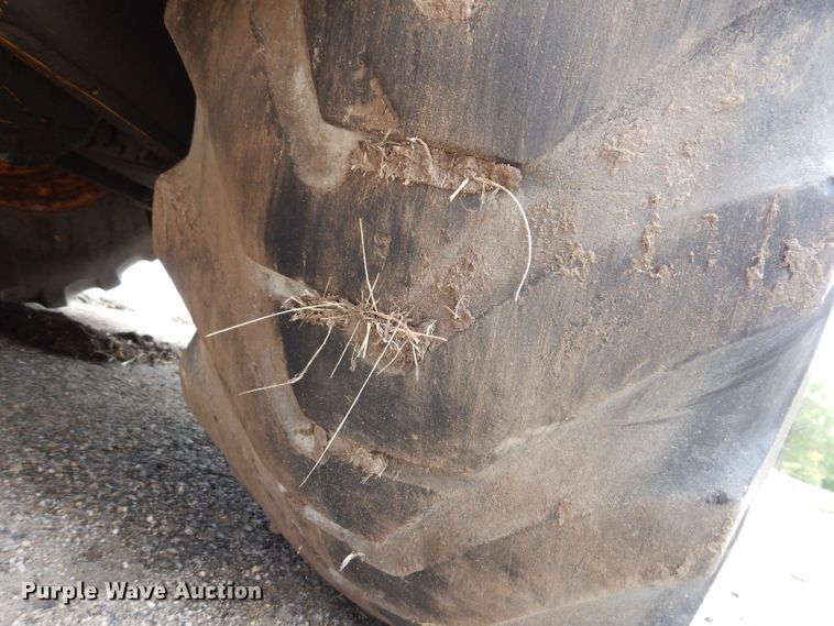 image for item KP9384 1998 John Deere 710D  backhoe