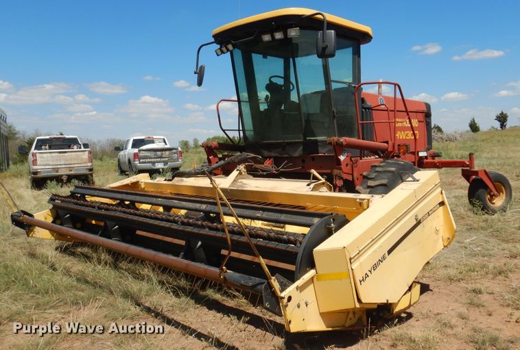 image for item DB7818 2002 New Holland HW300  windrower