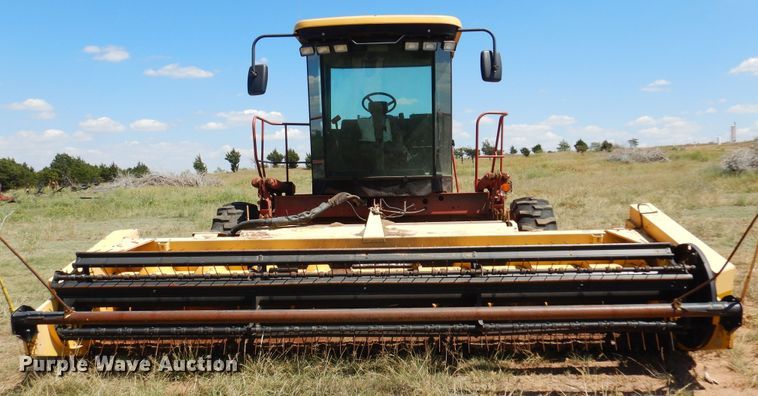 image for item DB7818 2002 New Holland HW300  windrower