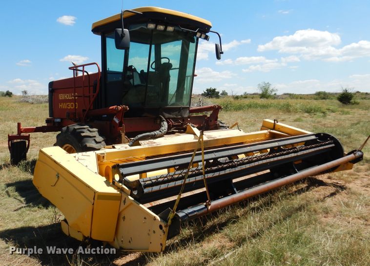 image for item DB7818 2002 New Holland HW300  windrower