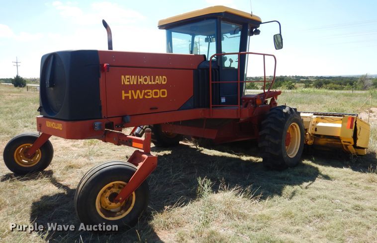 image for item DB7818 2002 New Holland HW300  windrower