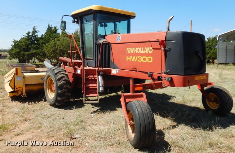 image for item DB7818 2002 New Holland HW300  windrower