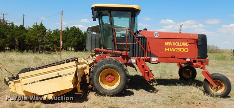 image for item DB7818 2002 New Holland HW300  windrower