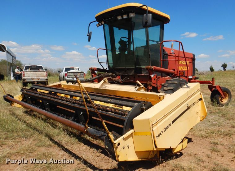 image for item DB7818 2002 New Holland HW300  windrower