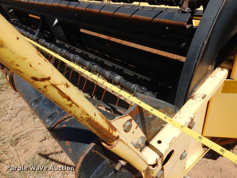 image for item DB7818 2002 New Holland HW300  windrower