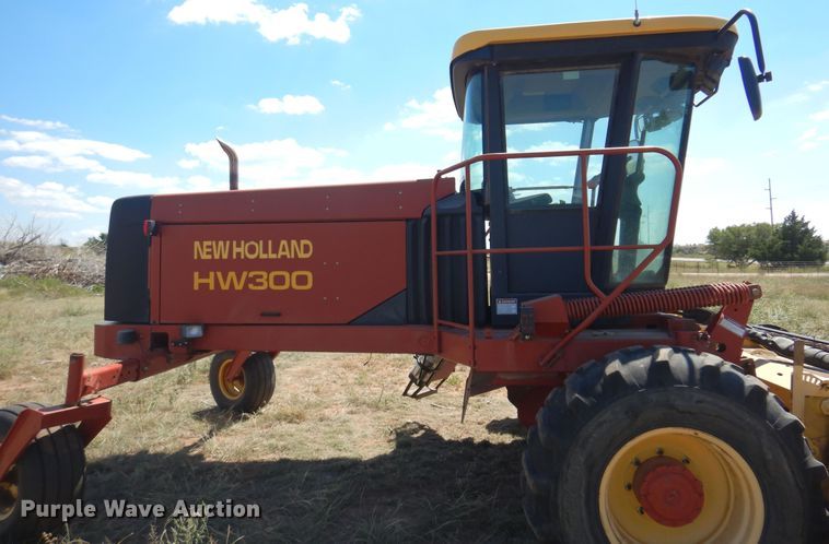 image for item DB7818 2002 New Holland HW300  windrower