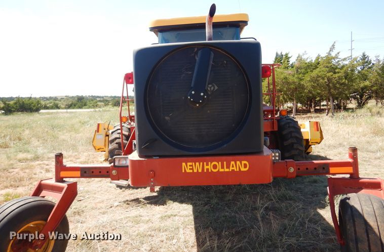 image for item DB7818 2002 New Holland HW300  windrower