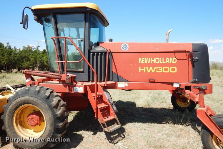 image for item DB7818 2002 New Holland HW300  windrower