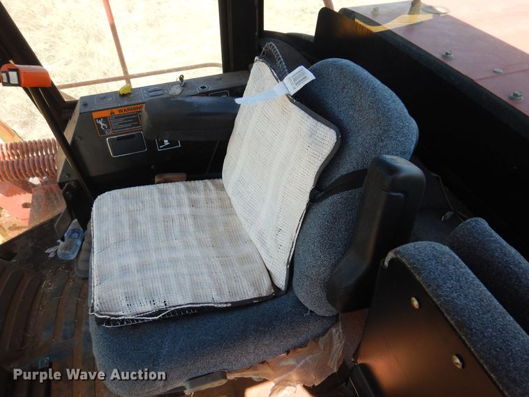 image for item DB7818 2002 New Holland HW300  windrower