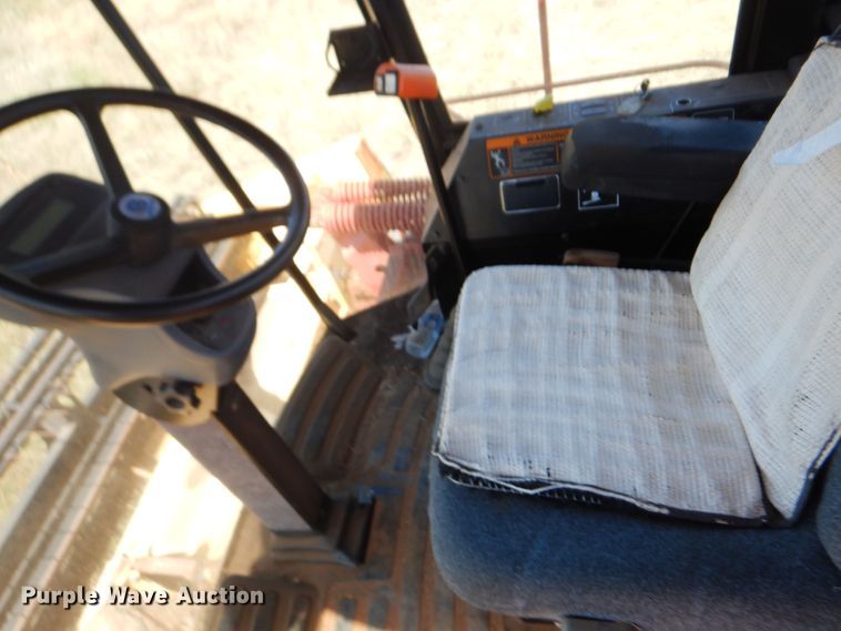 image for item DB7818 2002 New Holland HW300  windrower