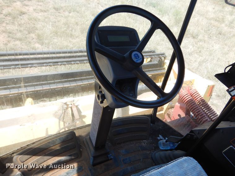 image for item DB7818 2002 New Holland HW300  windrower