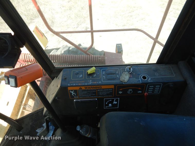 image for item DB7818 2002 New Holland HW300  windrower