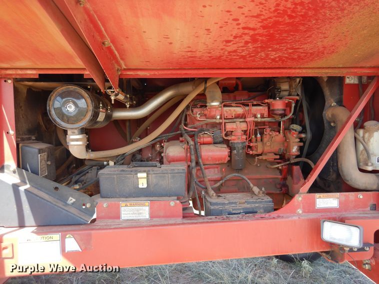 image for item DB7818 2002 New Holland HW300  windrower