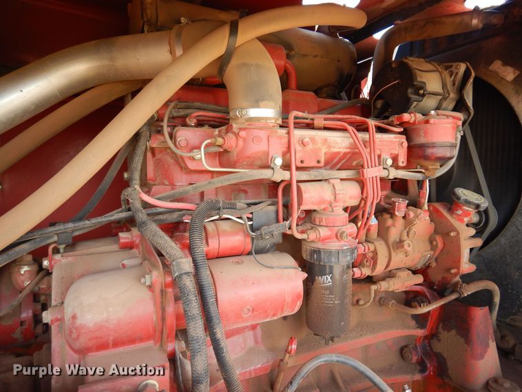 image for item DB7818 2002 New Holland HW300  windrower