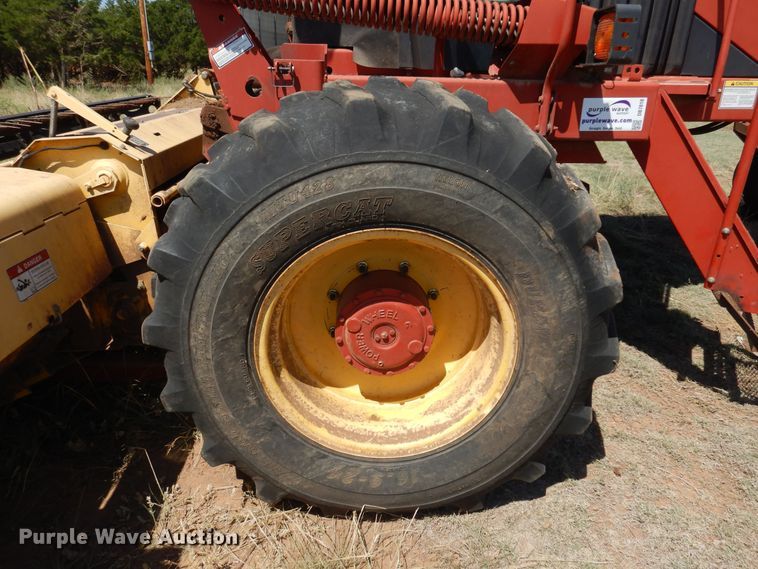 image for item DB7818 2002 New Holland HW300  windrower