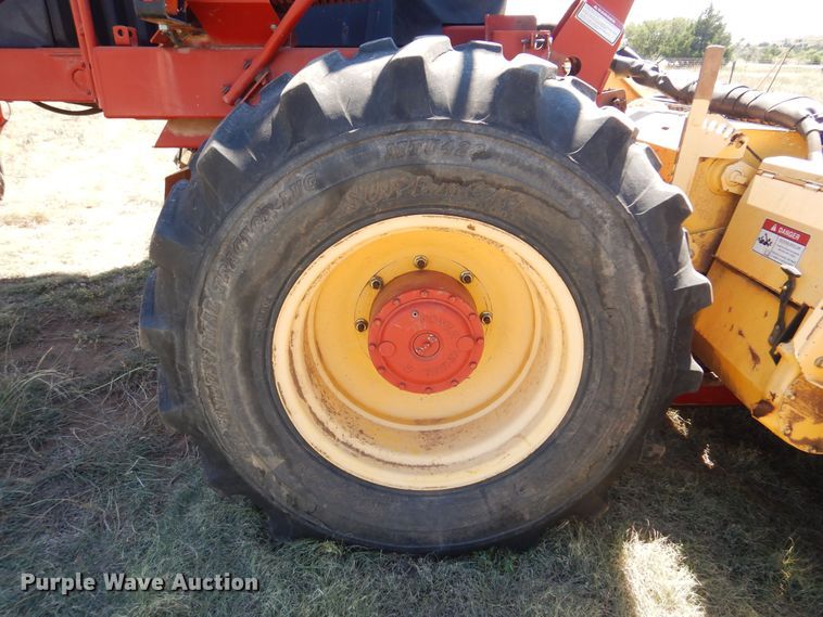 image for item DB7818 2002 New Holland HW300  windrower