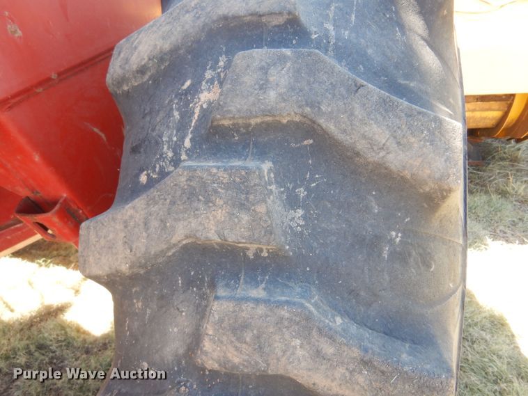 image for item DB7818 2002 New Holland HW300  windrower