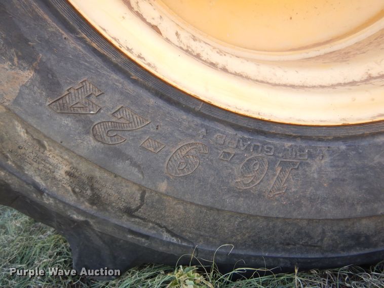 image for item DB7818 2002 New Holland HW300  windrower