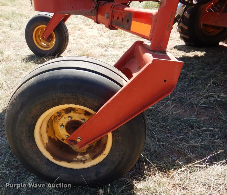 image for item DB7818 2002 New Holland HW300  windrower