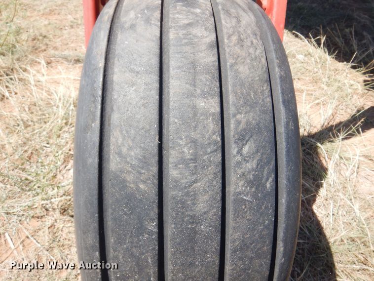 image for item DB7818 2002 New Holland HW300  windrower