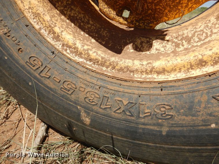 image for item DB7818 2002 New Holland HW300  windrower