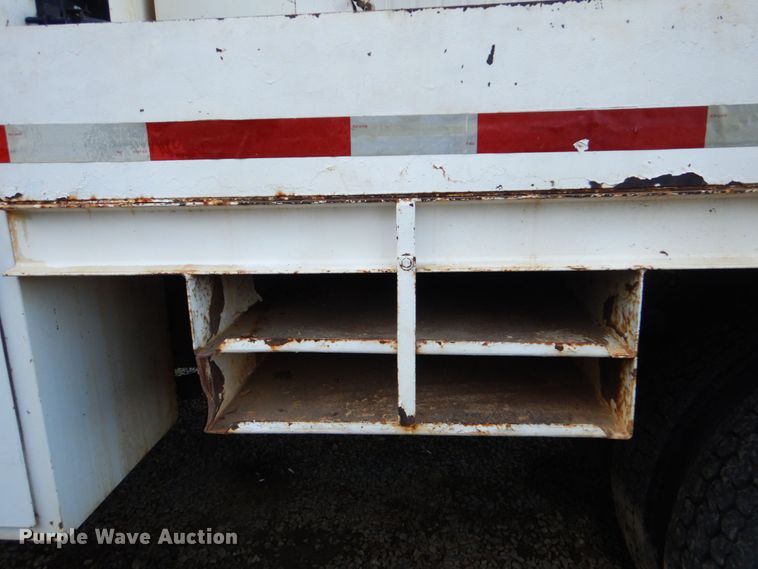 image for item DO1571 2004 Ford F750 Super Duty  digger derrick truck