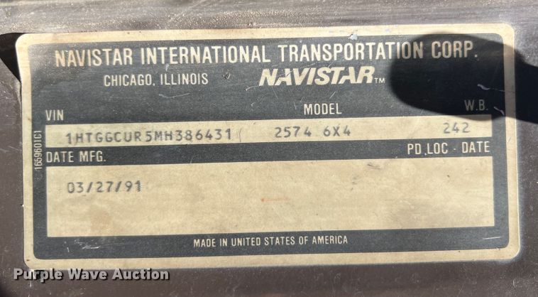 image for item JX9468 1991 International F2574  roll-off container truck