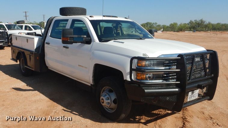 image for item DJ8993 2015 Chevrolet Silverado 3500HD  Crew Cab flatbed pickup truck