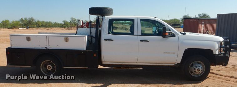 image for item DJ8993 2015 Chevrolet Silverado 3500HD  Crew Cab flatbed pickup truck