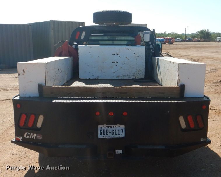 image for item DJ8993 2015 Chevrolet Silverado 3500HD  Crew Cab flatbed pickup truck