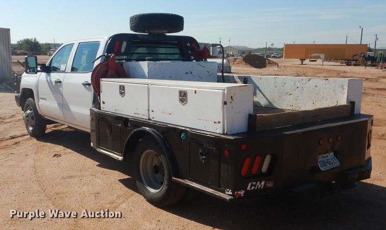 image for item DJ8993 2015 Chevrolet Silverado 3500HD  Crew Cab flatbed pickup truck