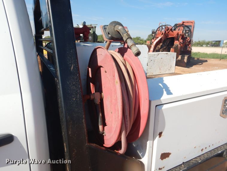 image for item DJ8993 2015 Chevrolet Silverado 3500HD  Crew Cab flatbed pickup truck