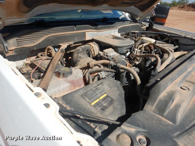 image for item DJ8993 2015 Chevrolet Silverado 3500HD  Crew Cab flatbed pickup truck